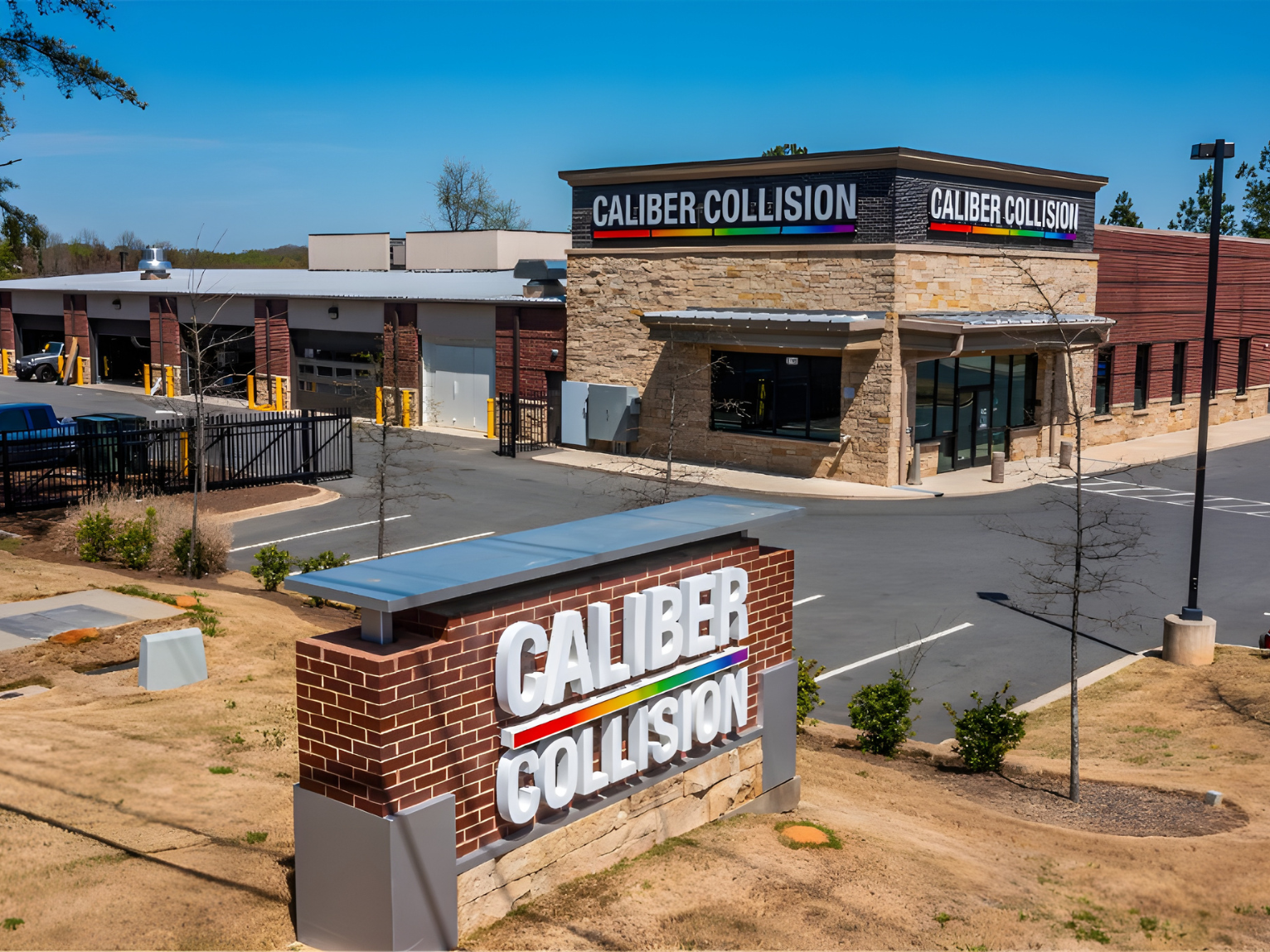 Caliber Collision repair center construction by Metrolina Builders, designed for high-efficiency auto body work